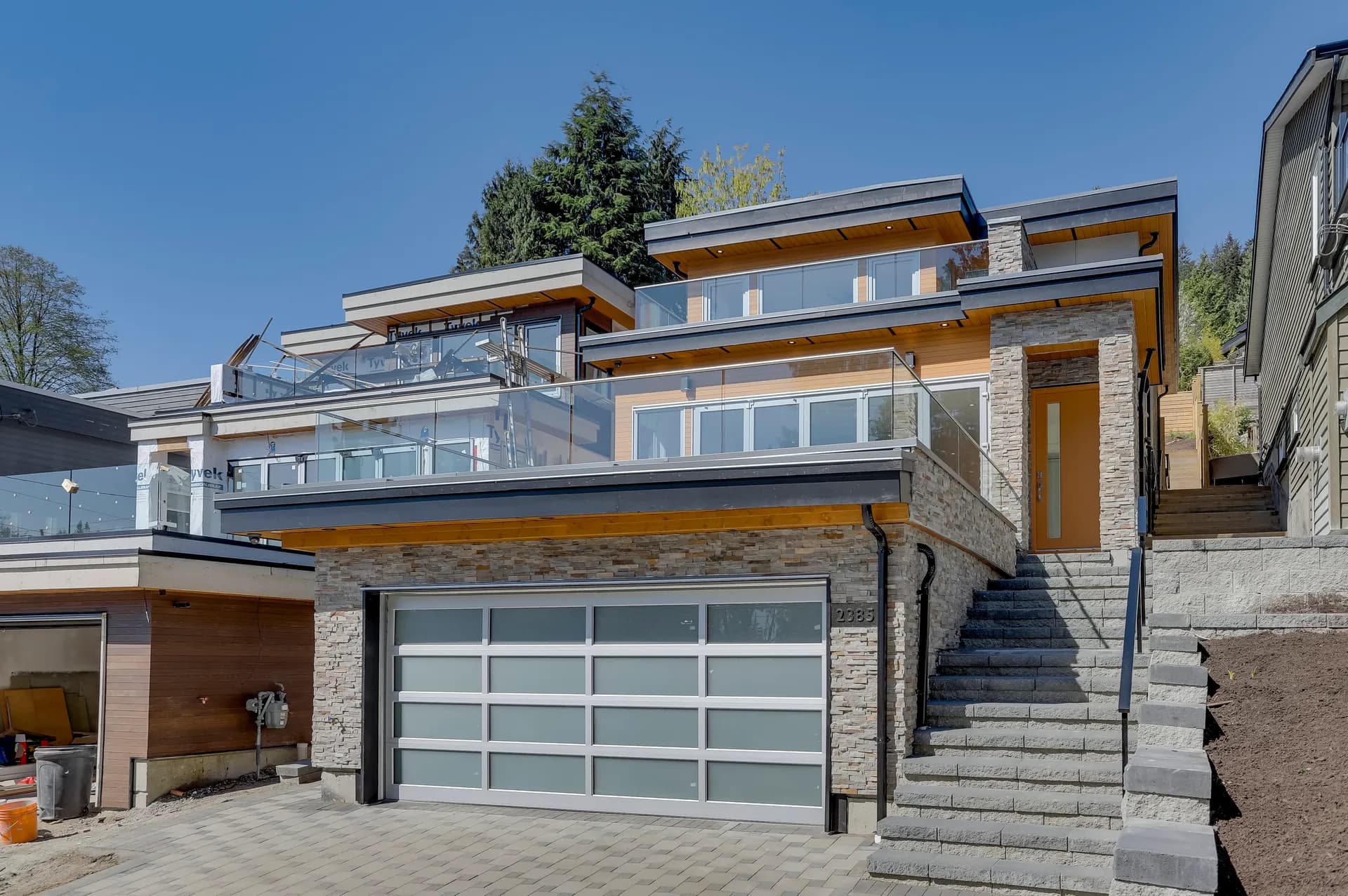 Deep Cove coastal modern home, daytime front exterior