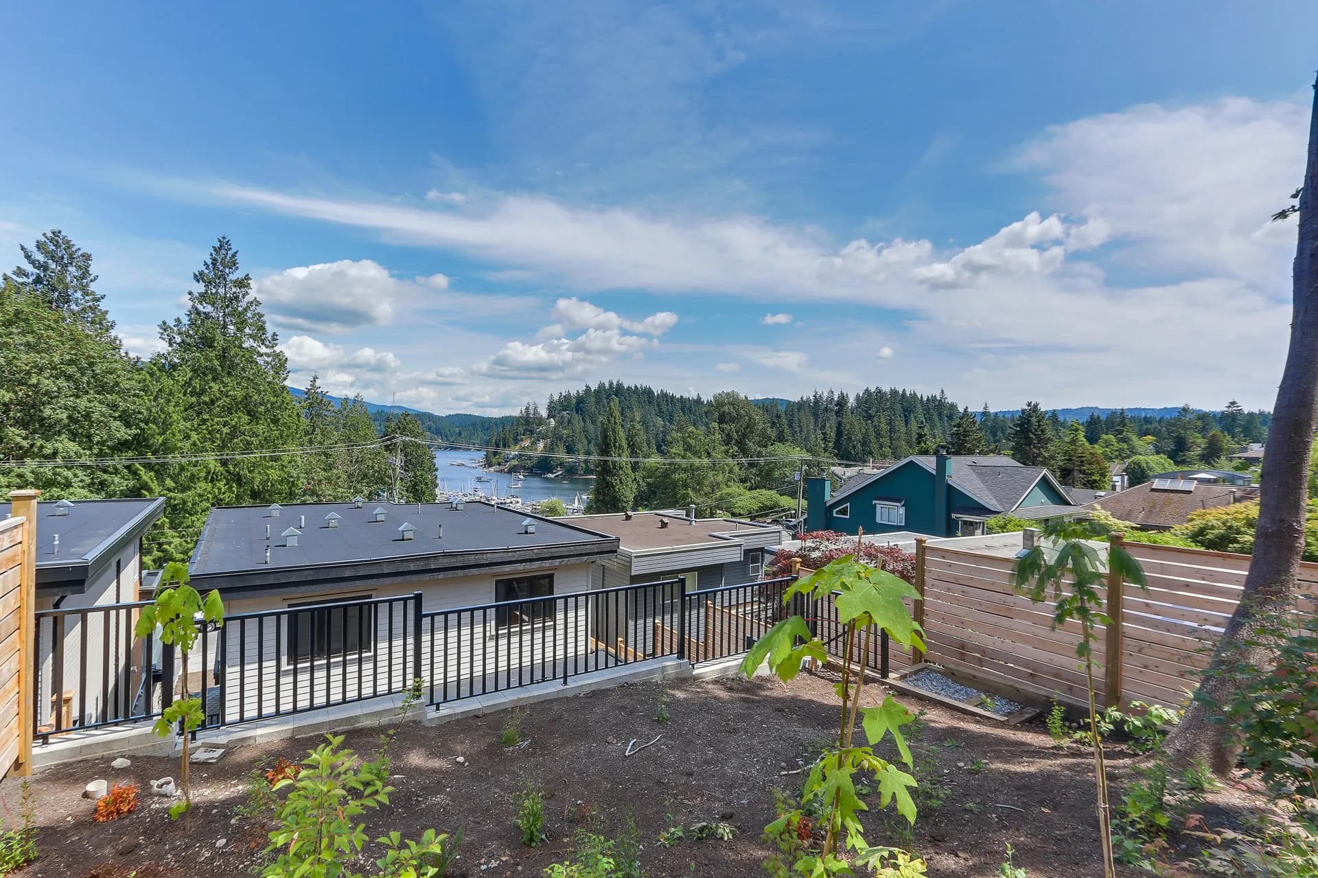 View over neighbouring rooftops to the Deep Cove inlet