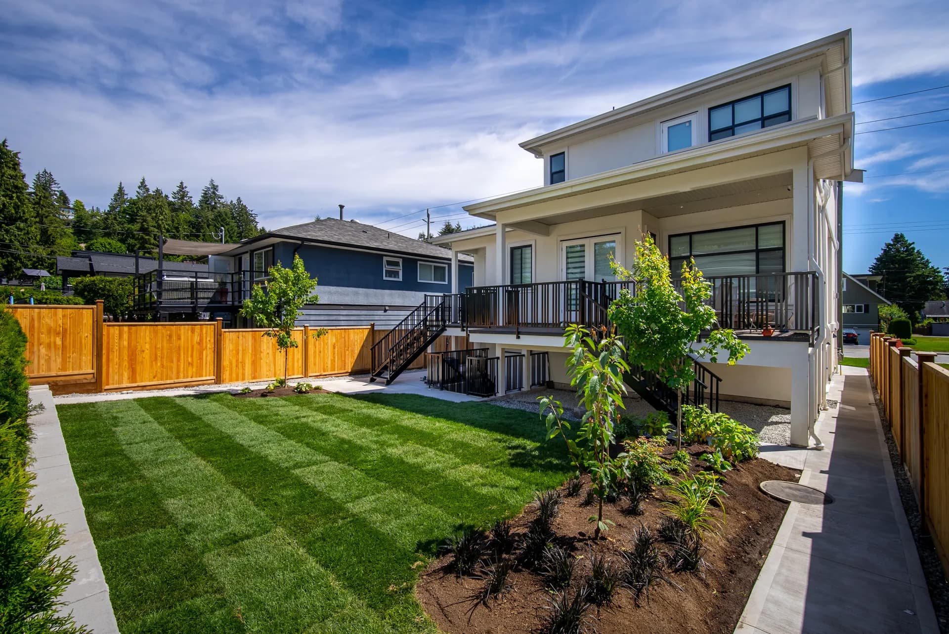 Lower Lonsdale heritage custom home in North Vancouver, daytime front exterior, view 3