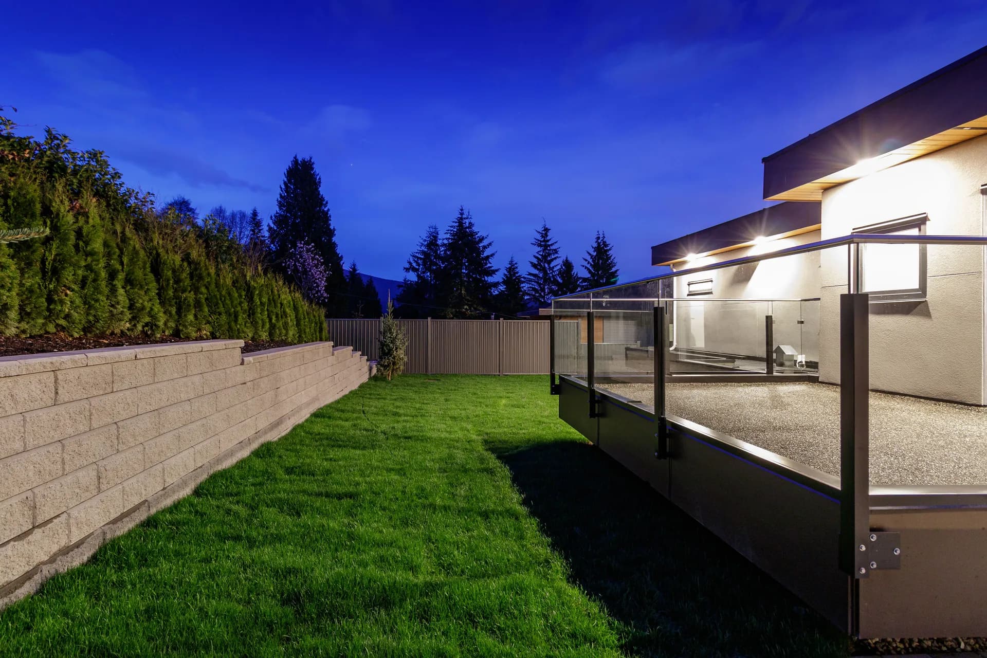 Lynn Valley three storey custom home, twilight front exterior, view 8