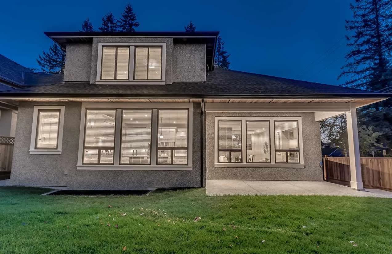 Maple Ridge modern custom home, twilight rear exterior