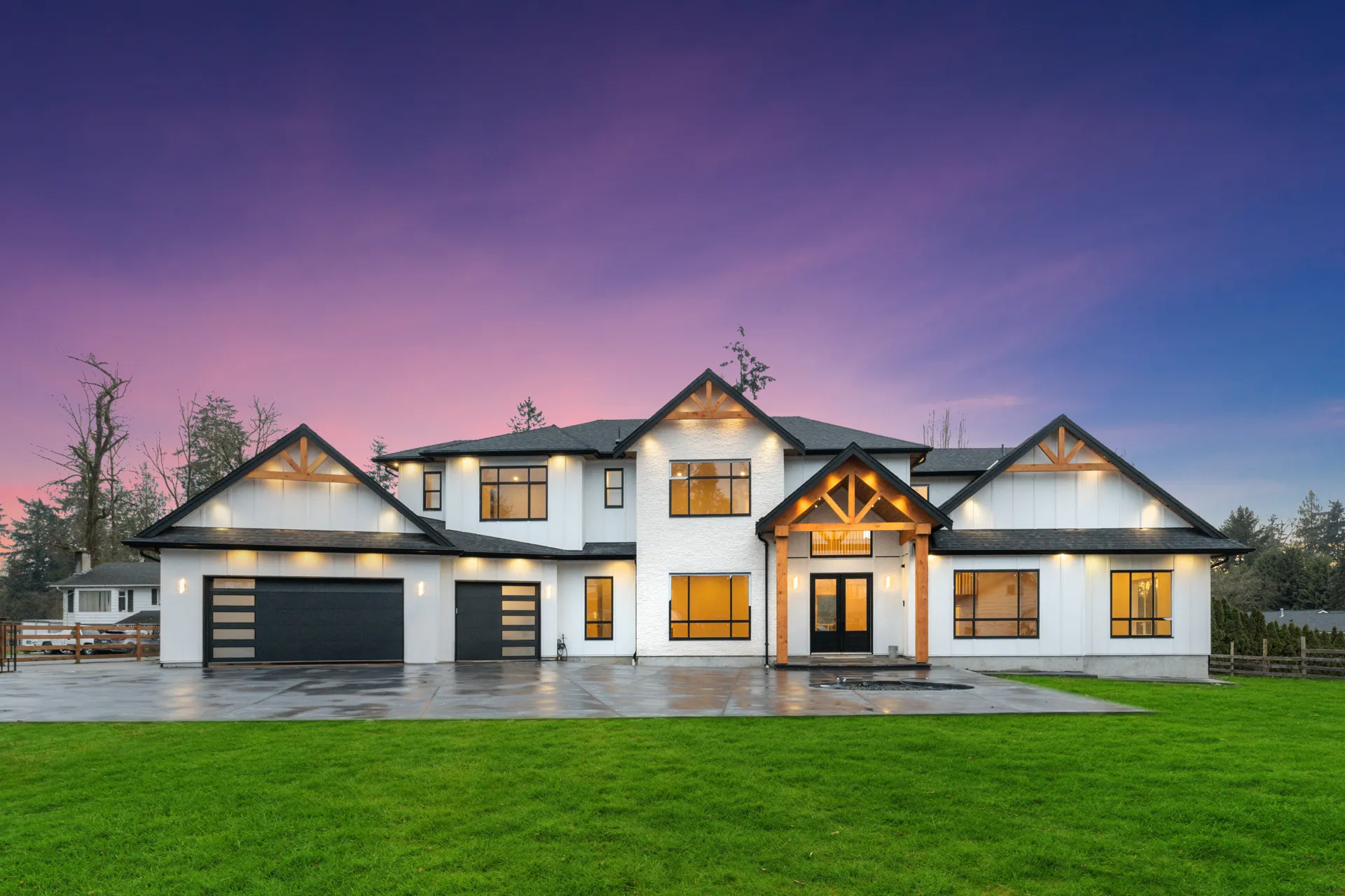 Langley modern farmhouse estate at twilight, delivered on schedule by Major Homes